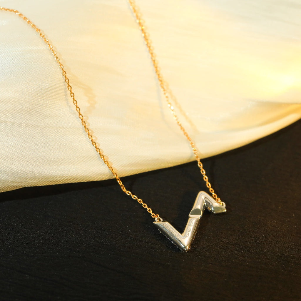 LOUIS VUITTON VOLT SILVER DIAMOND PEDANT NECKLACE