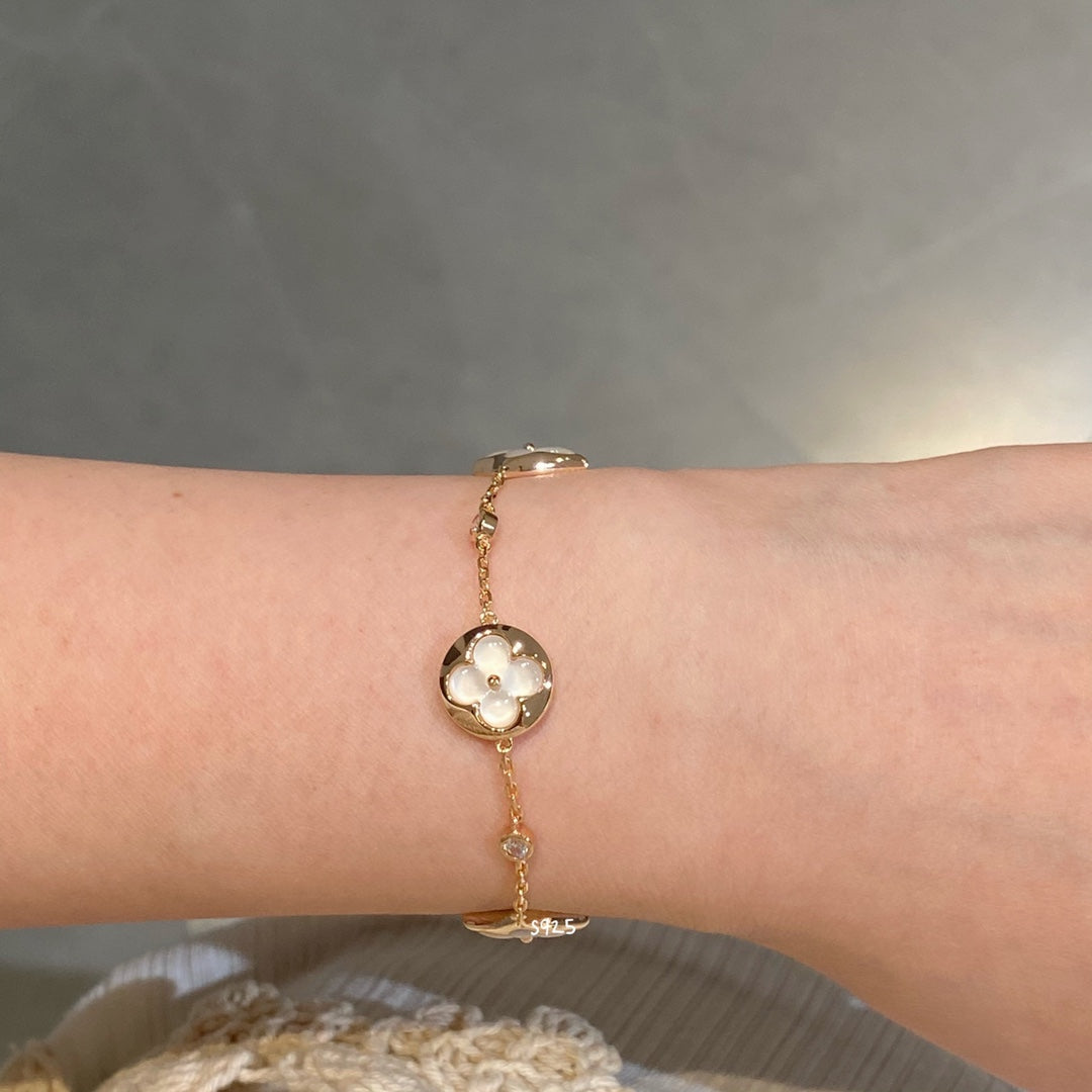 LOUIS VUITTON STAR AND SUN 4 MOTIF WHITE MOP PINK GOLD BRACELET